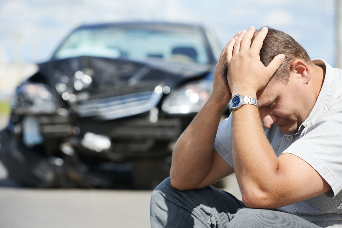 a man upset after an accident because he doesn't have Car Insurance in Fremont, Berkeley, Santa Clara, San Francisco, Oakland, Hayward, CA