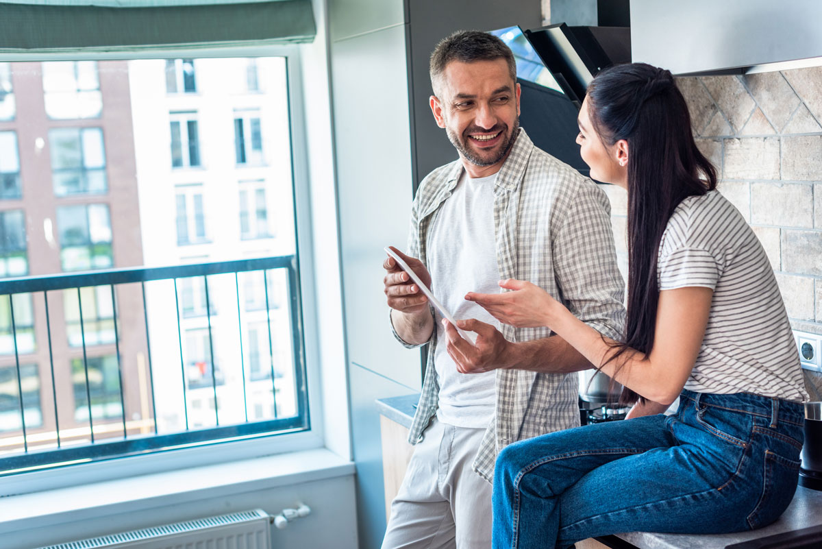 couple reviewing their options for Property Insurance in Santa Clara, San Francisco, Fremont, Hayward, CA, Oakland, Berkeley and Nearby Cities