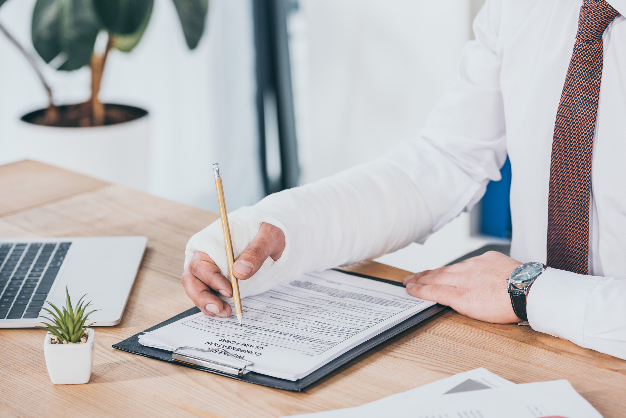 worker with cast and General Liability Insurance and More
