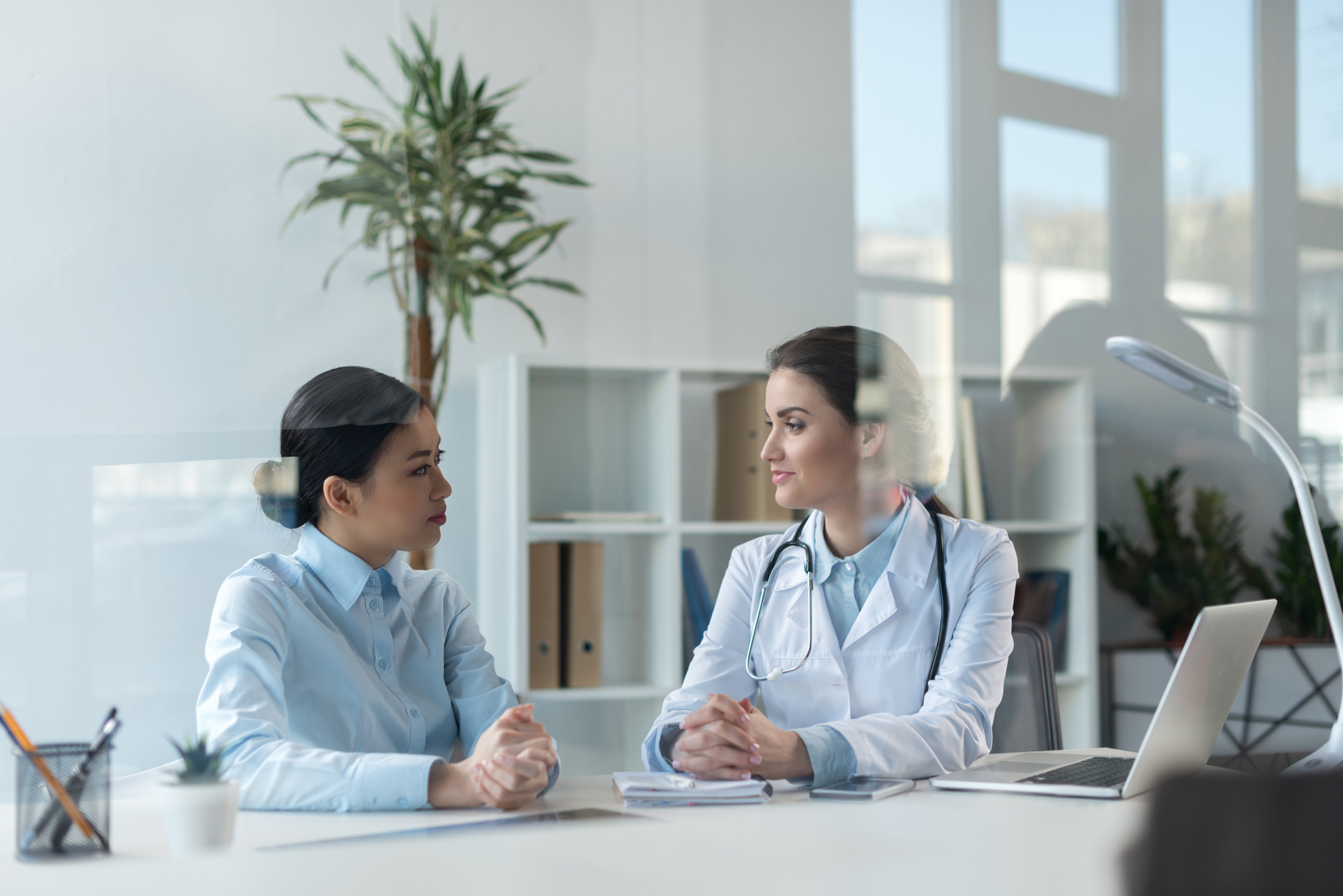 two people discussing Medical Offices Insurance in Santa Clara, Fremont, Hayward, Berkeley, San Francisco, Oakland, CA, and throughout the Bay Area