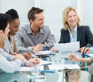 Employees of a mid-sized company in Oakland, CA discussing a project